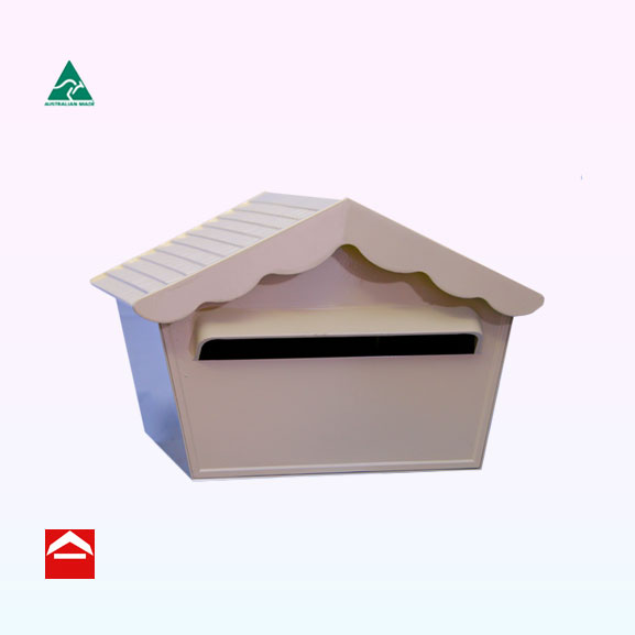 Chalet style letterbox with scalloped eve. Has tiled roof and cast aluminium front and back plates. Rear open. Not suitable for A4 mail.
