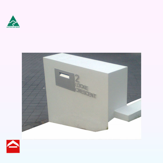Image of stainless steel front plate with stainless steel address pinned to wall